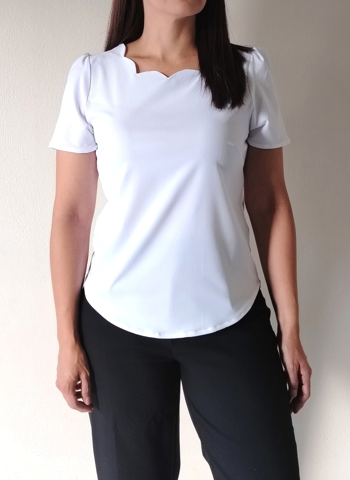 Blusa parras en escote