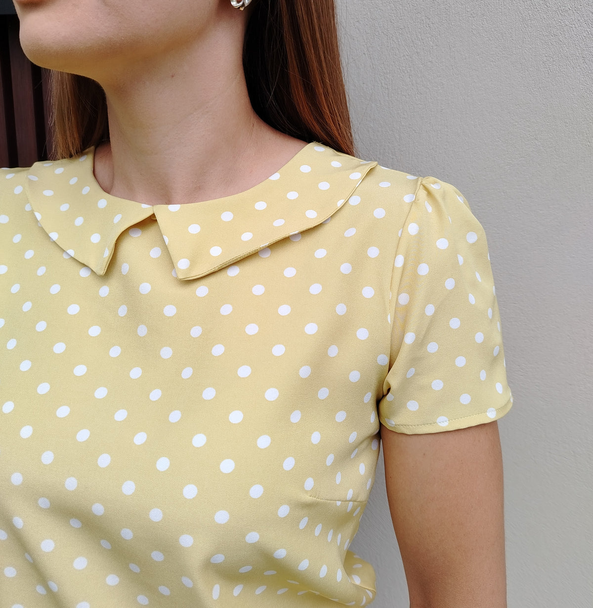 Blusa cuello muñeca
