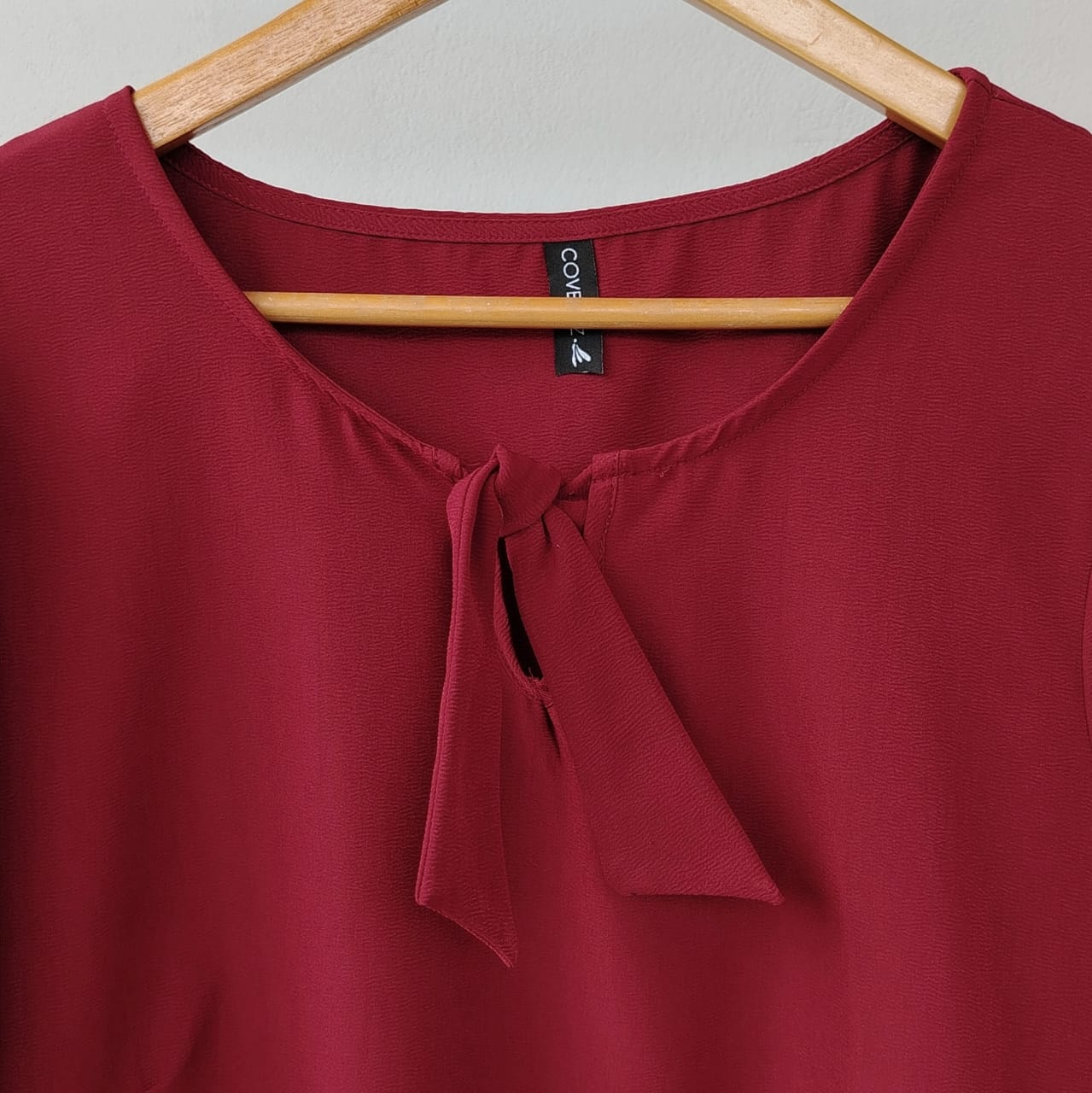 Blusa amarre vino