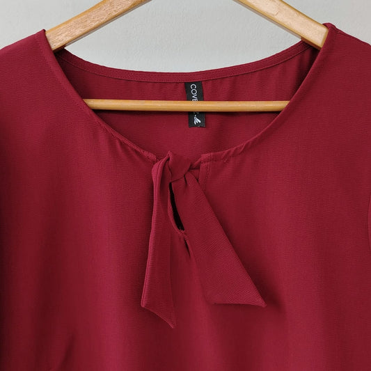 Blusa amarre vino