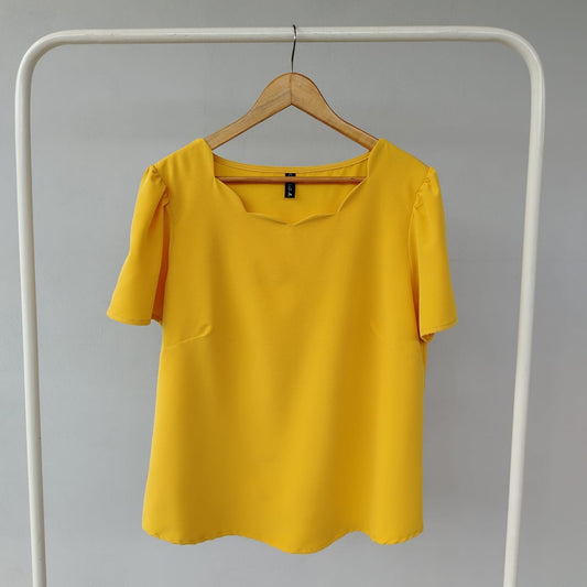 Blusa parras mostaza