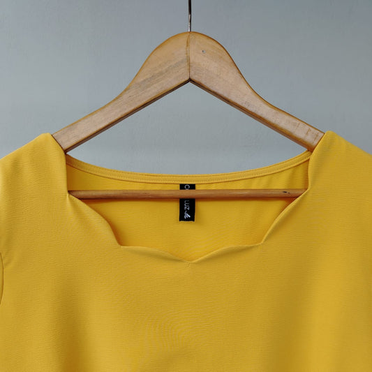 Blusa parras mostaza