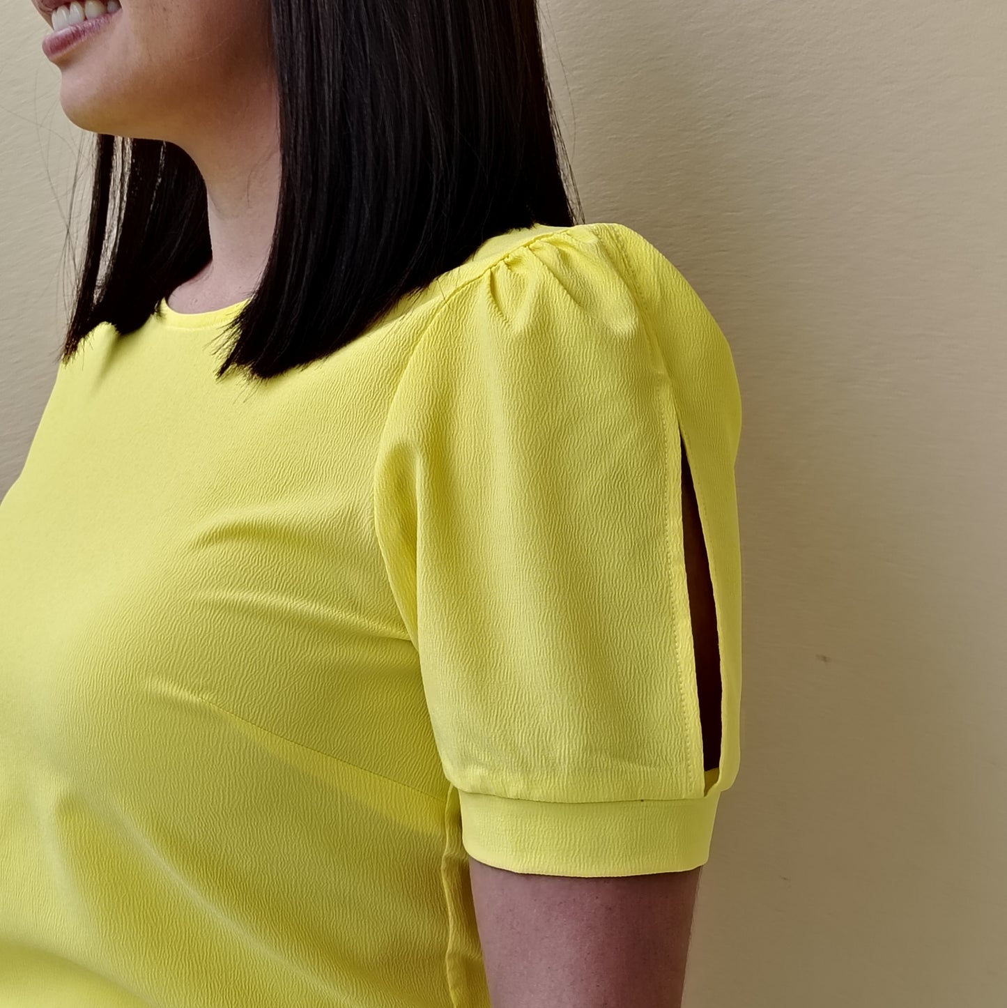 Blusa abertura en manga