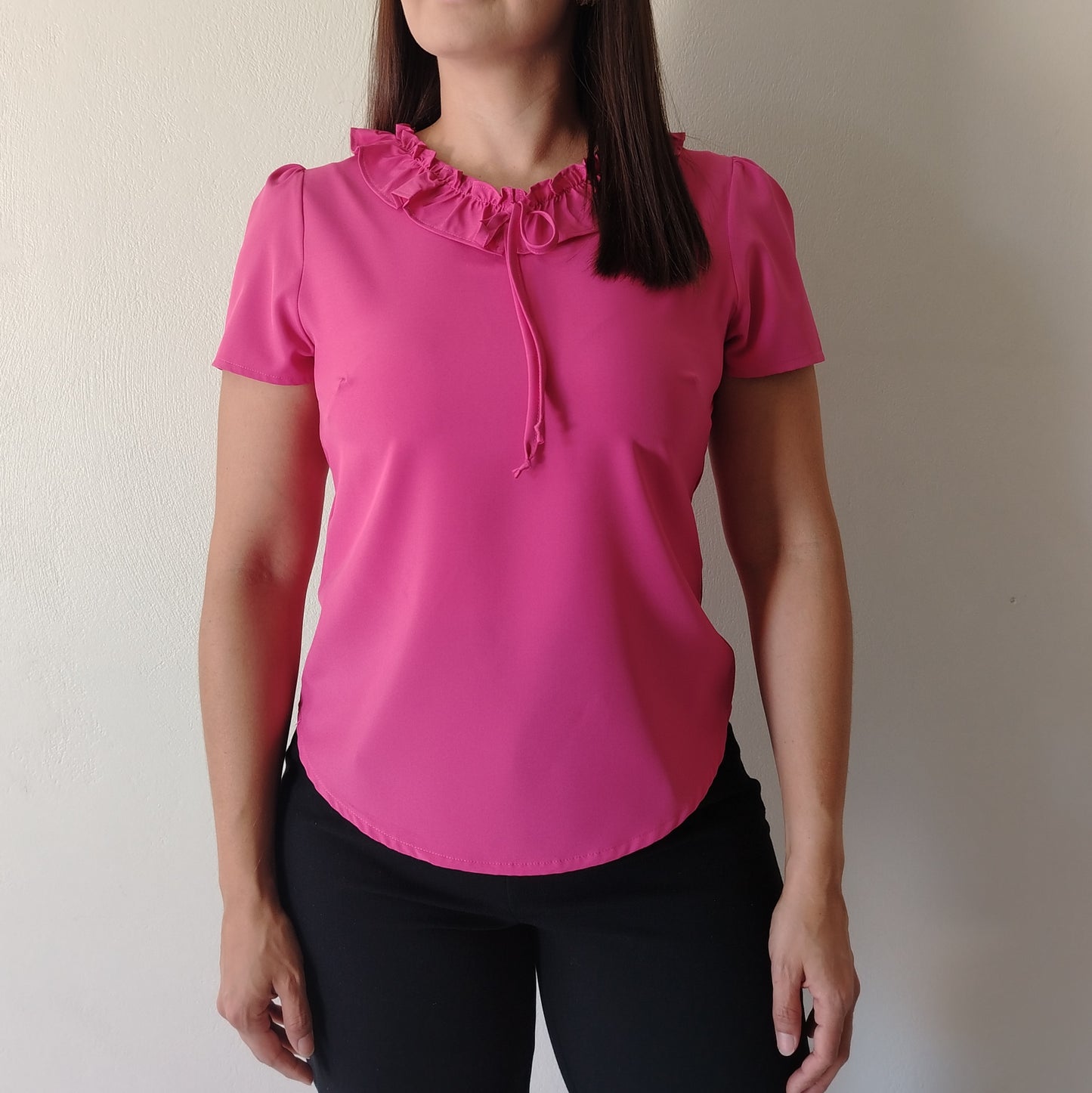 Blusa escote con vuelos