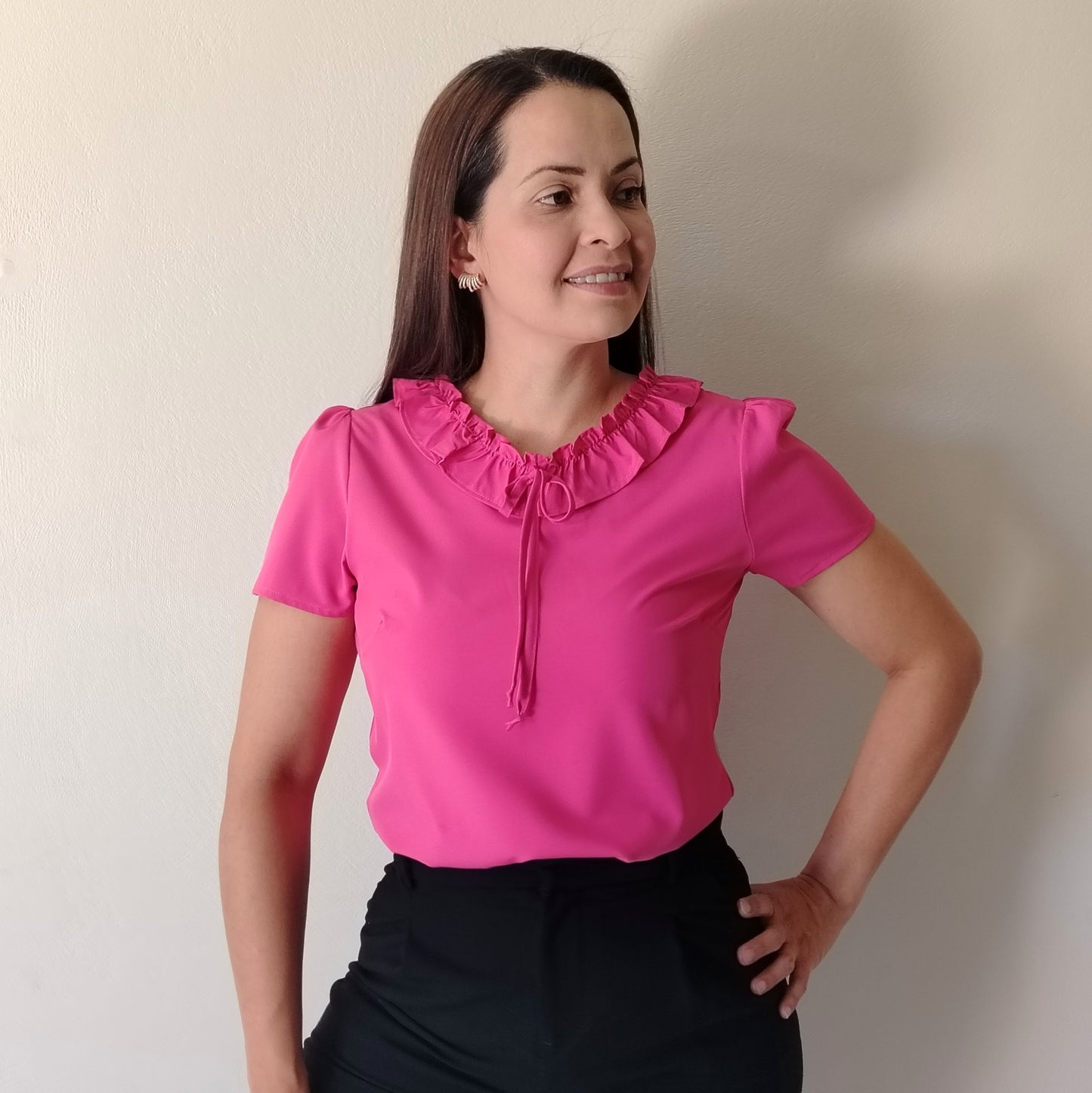 Blusa escote con vuelos