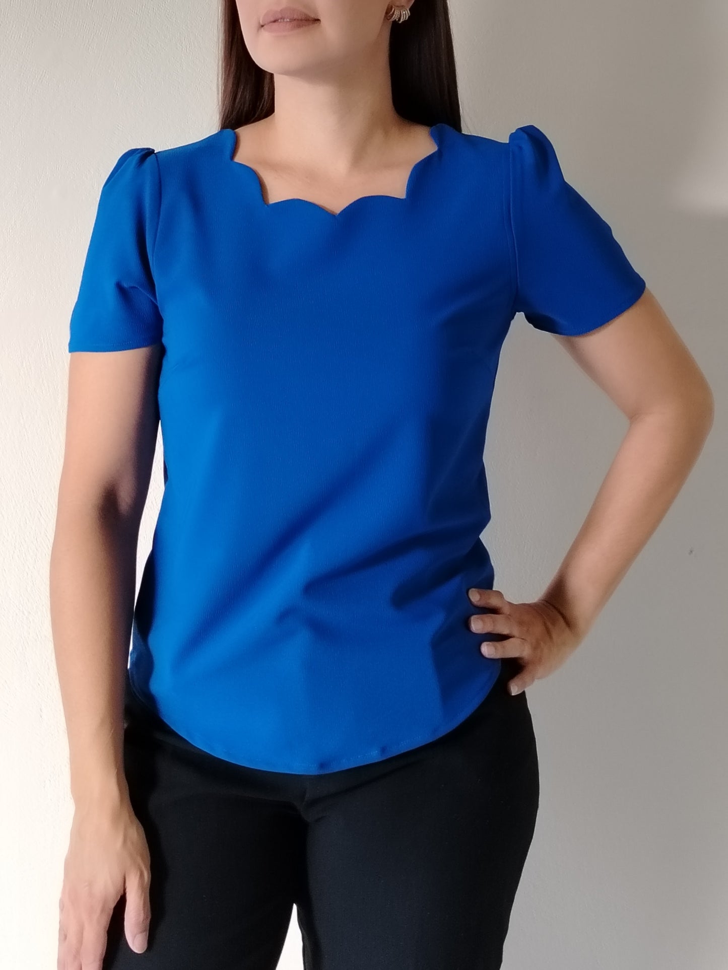Blusa parras en escote