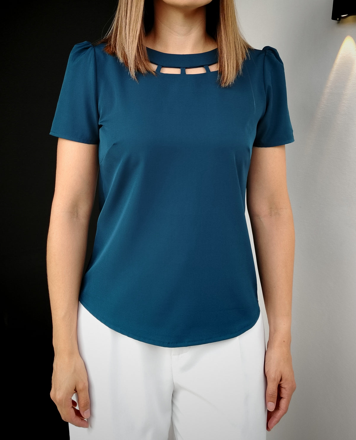 Blusa cadena en escote