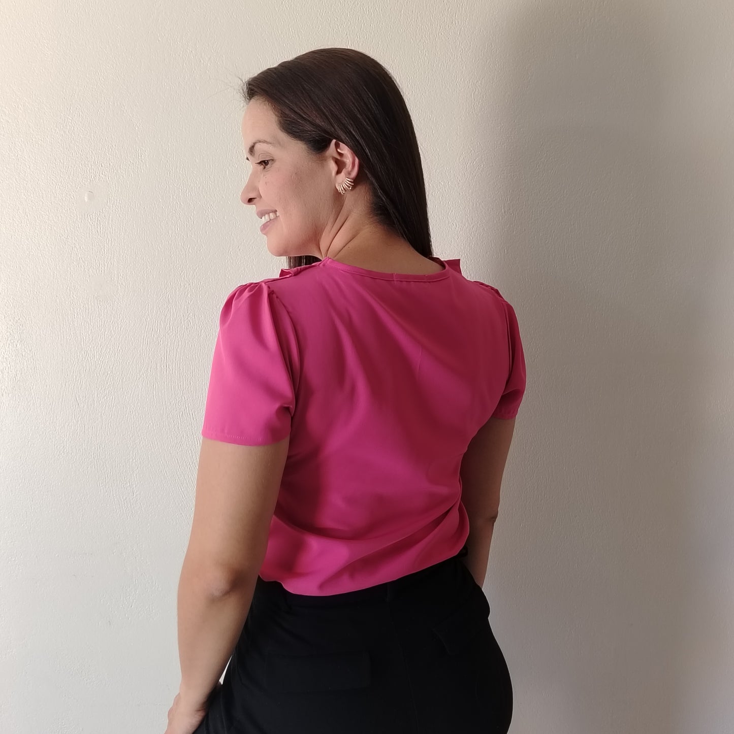 Blusa escote con vuelos